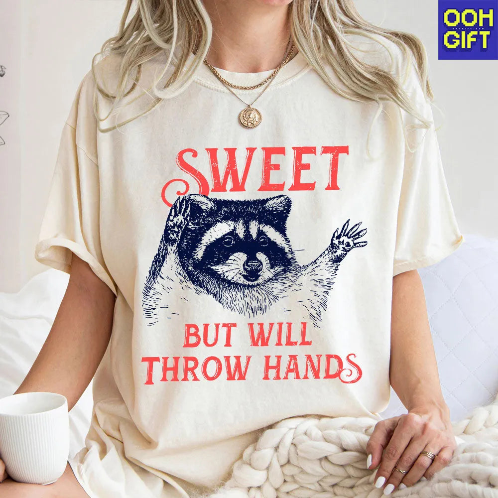 Sweet But Will Throw Hands T-Shirt | Funny Raccoon Meme Shirt for Women