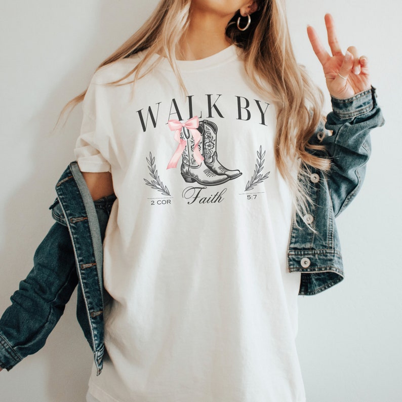 Coquette Cowgirl Boots Christian Tshirt, Walk By Faith Aesthetic Pink Bow 
Shirt, Trendy Jesus Faith Apparel Gift, Religious Friend Gift Idea